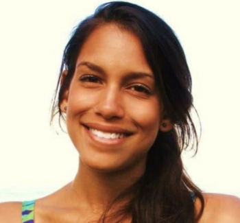 headshot of a brunette woman
