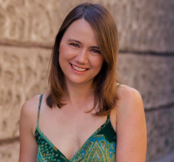 headshot of a woman with red hair