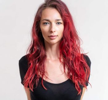 woman with red hair and blue eyes