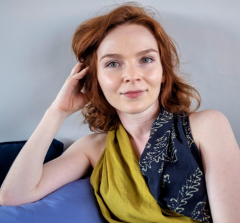 woman with a curly red hair