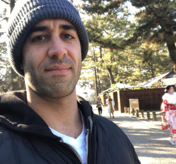 headshot of a man wearing beanies