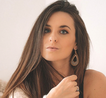 headshot photo of a woman with long hair