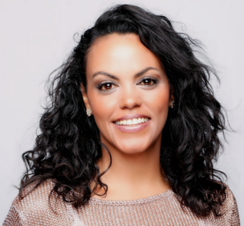 headshot photo of a woman smiling