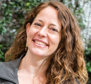 headshot photo of a woman smiling