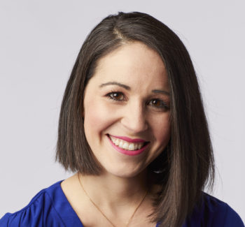 headshot photo of a woman smiling