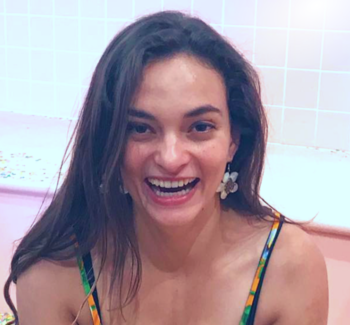 headshot photo of a woman smiling