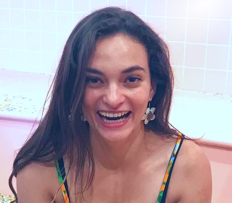 headshot photo of a woman smiling