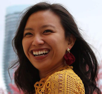 headshot photo of a woman smiling