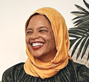 a lady smiling over an interview