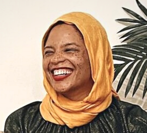 a lady smiling over an interview