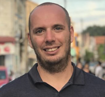 man with a warm smile