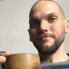 man holding a coffee cup