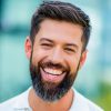 man with a warm smile