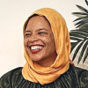 a lady smiling over an interview